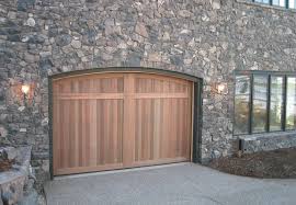 A natural wood carriage house door is the kind of door that gets people talking. Is A Wood Garage Door Right For You The Door House Inc
