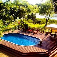 15 Above Ground And In Ground Pool Deck Ideas Backyard Pool Above Ground Pool Landscaping Pool Landscape Design