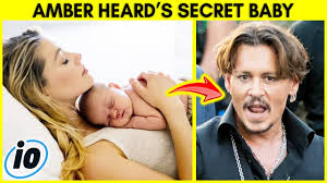 My baby is a.357 magnum. Amber Heard Welcomes Secret Baby Youtube