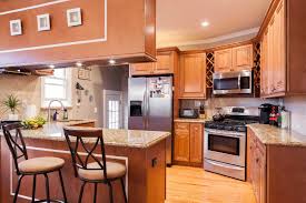 cinnamon maple glazed cabinet stone expo