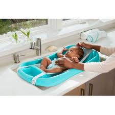 The slideguard® mat and contoured sides help keep your baby steady. Amazon Com The First Years Sure Comfort Deluxe Newborn To Toddler Tub Teal Baby Bathing Seats And Tubs Baby
