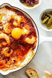 Season with salt and pepper to taste, frying for about 1 minute per side. Tunisian Shakshuka With Shrimp Recipe Recipe Recipes Shakshuka Nyt Cooking