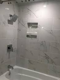 Msi 12 In X 24 In Carrara Polished Porcelain Floor And Wall Tile 16 Sq Ft Case Nhdcarr1224p The Home Depot Bathroom Remodel Shower Small Bathroom Remodel Bathrooms Remodel