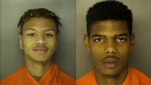 2 charged in attempted gunpoint robbery at strip club