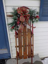 See more ideas about christmas, christmas decorations, christmas sled. Our Childhood Sled That My Sister Had The Foresight To Save She Was Gracious En Christmas Sled Decoration Christmas Decorations Vintage Christmas Decorations