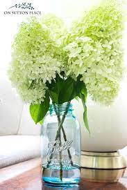 Arranging Hydrangeas The Easy Way On Sutton Place Mason Jar Decorations Hydrangea Arrangements Home Floral Arrangements