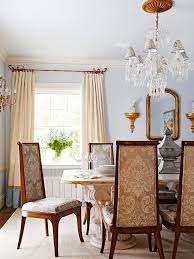 Large zen medium tone wood floor enclosed dining room photo in los angeles with beige walls and no fireplace. Elegant Dining Room Design