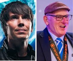 Professor Brian Cox had the opportunity to hold Oldham Athletic's National  League play-off winners' trophy, and he was presented with the Oldham coat  of arms during a special homecoming visit this week.⚽