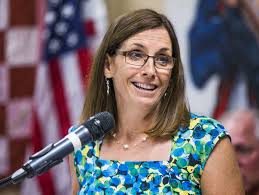 Democratic party's new ad blitz features Paul Ryan, Martha McSally