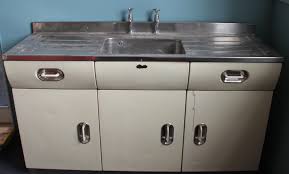 a 1950's english rose kitchen sink unit