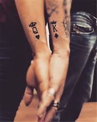 This colorful pair is a fun couple tattoos idea with a deep meaning. 25 Coolest Couple Matching Tattoo Designs For Your Inspiration Women Fashion Lifestyle Blog Shinecoco Com