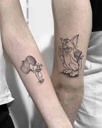 You can get your favorite cartoon tattoo inked anywhere on your body. Tom And Jerry Matching Couple Tattoos