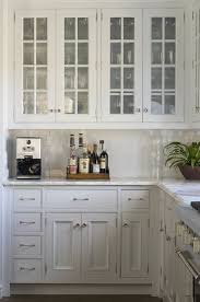 Phoebe Howard Charming Kitchen With Glass Front Upper Kitchen Cabinets Filled With Crystal W Kitchen Inspirations Home Kitchens Glass Fronted Kitchen Cabinets