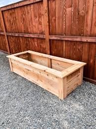 Corner brackets make it so anyone can build their own raised garden bed. How To Make Cedar Raised Garden Beds