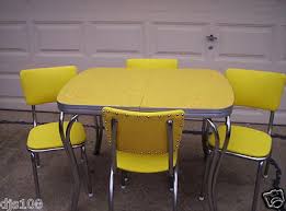 Available laminate table tops today include discontinued formica boomerangs in aqua, coral and blue! Vintage 1950 S Yellow Cracked Ice Kitchen Formica Table 4 Chairs Antique Price Guide Details Page