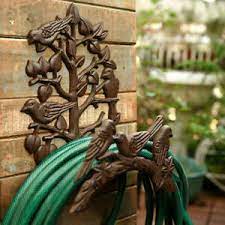 Since this month's diy project challenge was to create something using wood, my diy garden hose holder and storage post with hooks and solar. Heavy Duty Cast Iron Hose Holder Garden Yard Decorative Wall Mounted Hose Reel Ebay