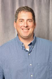 Small Arms, Big Staches From left, Sgt. 1st Class David Musso of the 3643rd  Brigade Support Battalion and Tech Sgt. Connor Cunio of the 157th Air  Refueling Wing flank the New Hampshire