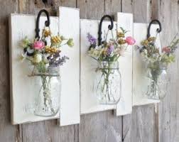 Pin By Leshay Black On Mason Jar Diy In 2021 Wall Flower Vases Reclaimed Wood Wall Decor Mason Jar Diy