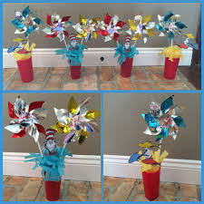 Birthday Party Table Decorations Diy Diy Dr Seuss Birthday Party Cake Table Decorations Using Pinwheels Tissu Dr Seuss Birthday Party First Birthday Centerpieces Birthday Party Table Decorations