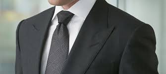 You want to hang the tie around your neck with the wider side longer than the narrow side. How To Tie A Windsor Knot The Easy Way Fashionbeans