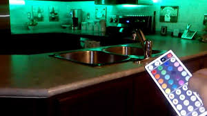 I have looked at puck lights and strip lights, but i don't know what the current trend is. Led Rgb 5meter Strips With 44key Remote Installed Under Kitchen Cabinets Www Ledxtremesource Com Youtube