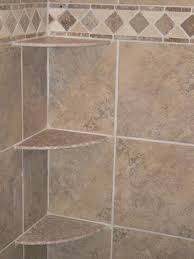 Can i use a shelf as a foot support while i'm shaving my legs in the shower? Corner Shelving In Bathtub Picture Shows A Shower With Corner Shelves Installed And Finished Shower Corner Shelf Tile Shower Shelf Shower Shelves