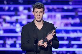 Justin Bieber Knocked Off Uk Singles Chart Top Spot By Shawn