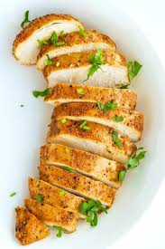 Once you've seasoned the chicken, put it on a greased baking pan and place it in the oven. Juicy Baked Chicken Breasts Foolproof Easy Method That Spicy Chick