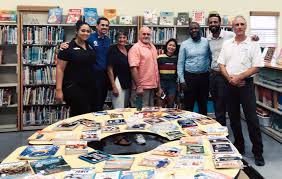Rotary Sunrise donates 500 books to West Bay school - Cayman Compass