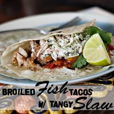 In a mixing bowl whisk together the oil, lime juice, garlic, chili powder, cumin, paprika, cayenne. Broiled Fish Tacos With Tangy Slaw Heather Likes Food
