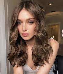 Long wavy locks allow more accessories to be added to your look. Wavy Hair Golden Brown Hair Color Light Golden Brown Hair Hair Color Light Brown