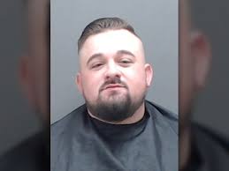 Bodycam video shows Harrison County deputy striking handcuffed man upon  arrival at jail