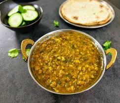 Dal Palak Is A Healthy And Sumptuous Dish Made Of Green Lentils And Spinach Cooked In A Spicy Onion Tomato Based Gravy Dal Palak Recipe Lentil Recipes Recipes