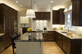 We would agree with this because apart it is also nice that there is a contrast between the dark cabinets and the light counter backsplash. Pin By Eescorza On House To Home Ideas For Shell Kitchen Design Kitchen Layout U Shape Kitchen Design