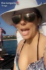 Eva Longoria wows in a brightly coloured bikini as she goes whale watching  in Mexico