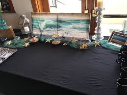 A Beach Themed Dessert Table At A Celebration Of Life Memorial With A Beach Theme Featuring Blue And Celebration Of Life Beach Theme Desserts Memorial Service