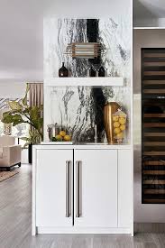 20 stylish home bars squeezed into small spaces. Small Kitchen Bar With White And Black Marble Contemporary Kitchen