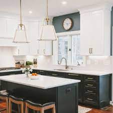 There are a lot of different materials you can use for your kitchen floors —from raw and original to glossy dark woods and painted colors, too. 75 Beautiful Dark Wood Floor Kitchen With Black Cabinets Pictures Ideas June 2021 Houzz