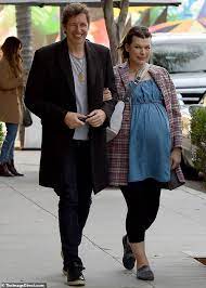 Milla jovovich and paul w.s. Milla Jovovich Shows Off Her Growing Baby Bump While Strolling With Husband Paul W S Anderson Daily Mail Online