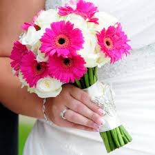 Love the way this white bouquet looks contrasted against the bridesmaids green dress. Flowers By Amanda Plymouth Florist Wedding Bouquets Flowers Flower Bouquet Wedding Wedding Flower Decorations Bridal Bouquet