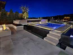 Luxury Pools And Modern Pool Design To Fit Your Outdoor Lifestyle Floating Steps Yorba Linda Modern Zero Edge Pool Modern Pool And Spa Spa Pool Luxury Pools