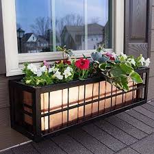 For winter fill the box with evergreens like cedar branches and pine boughs, pine cones, an 54 Springfield Rod Iron Metal Planter Box
