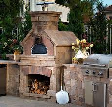 See a pizza oven featured in an amazing outdoor kitchen. Brick Outdoor Pizza Oven Designs