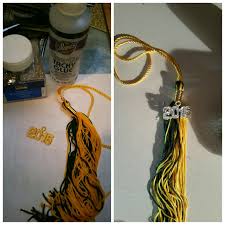 Graduation is probably the only place where this swinging ornament will ever be worn. Decorated Tassel For Graduation Cap Blinged Out Tassel With Tacky Glue And Fine Graded Glitter How To Bedazzle Graduation Cap Decoration Graduation Tassel