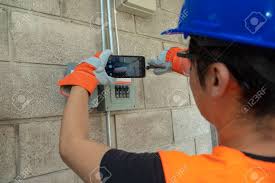 Young Electrician Fixing The Electrical System Of A House During Covid 19 Pandemic Making A Video Tutorial For Social Networks Stock Photo Picture And Royalty Free Image Image 164108136