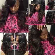 A side part will add glamour to this dark and sultry hairstyle! 22 Black Women Sew Ins Weaves Silk Press Hairstyles Ideas Black Women Sew Ins Hair African American Hair Extensions