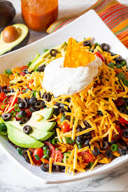 Mix the salsa and sour cream together until smooth. Ultimate Dorito Taco Salad Recipe Video A Spicy Perspective
