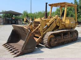Table, litter, scratch post, hallway, dresser, couch, counter, desk, lvngrm corner, kitchen window, balcony, door, bed, bed window, food. 1969 Caterpillar 977k Track Loader In Kansas City Ks Item J3515 Sold Purple Wave