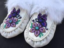 These vintage indian floral beaded moccasins feature a colorful flower pattern and a puckered vamp. 55 Beaded Mukluks Or Slippers Ideas Beaded Moccasins Bead Work Moccasin Pattern