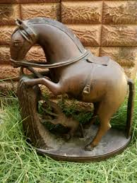 Decorated wooden horse statue with red and golden hues. Wooden Horse Statue For Home Decor Big Size Antique Showpieces Old Animal Figurine Vintage War Horse Collectible Sculpture 11 Inch Breeze Handicraft